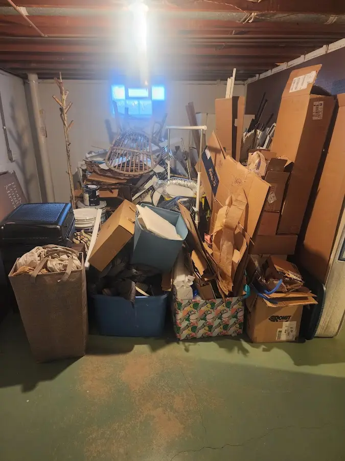 Roll-off dumpster container at job site for Yard Waste Dumpster Rental in Davenport